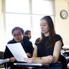 Student holding piece of paper
